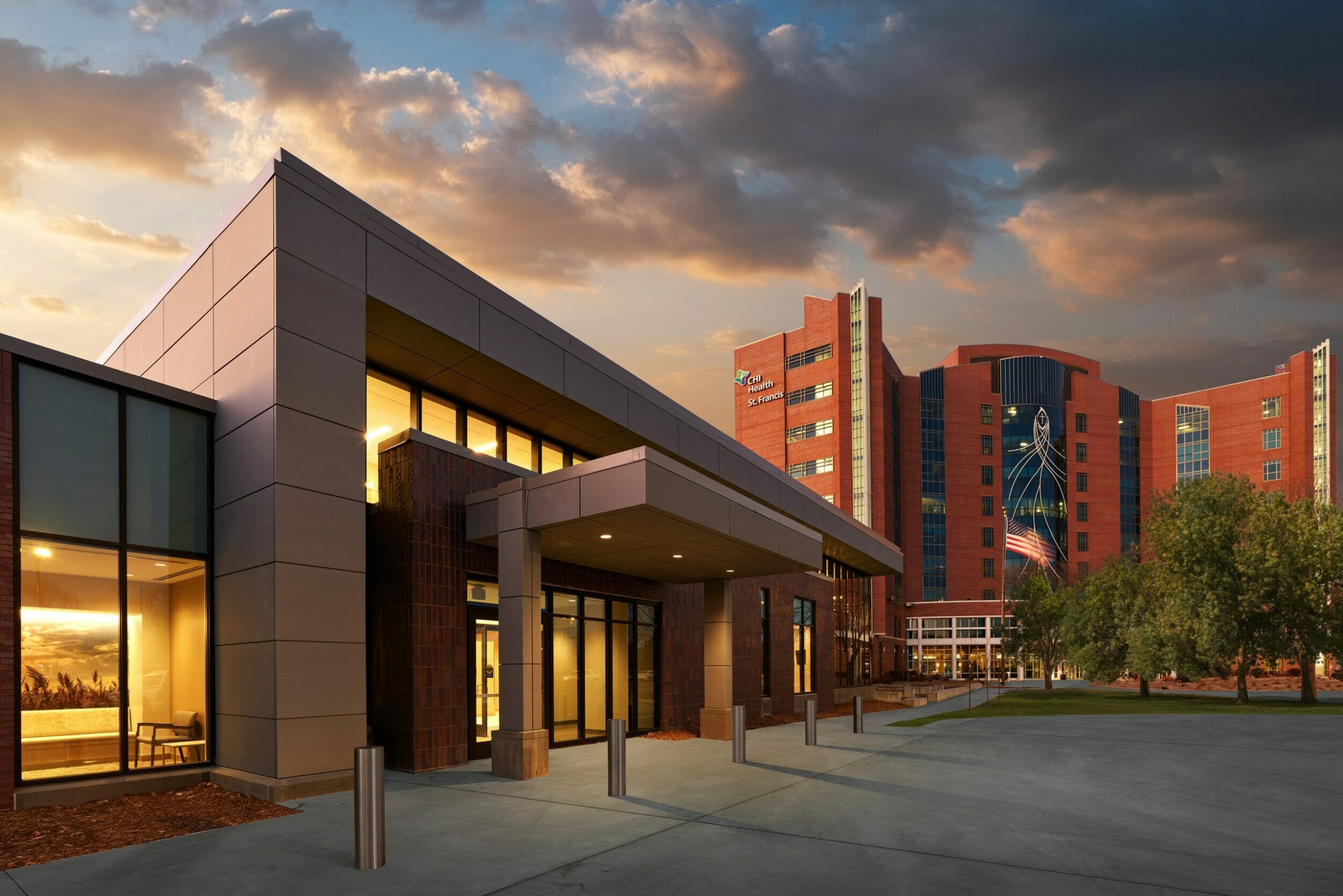 Dark clouds, exterior view entrance CHI Health Regional Cancer Center at St Francis