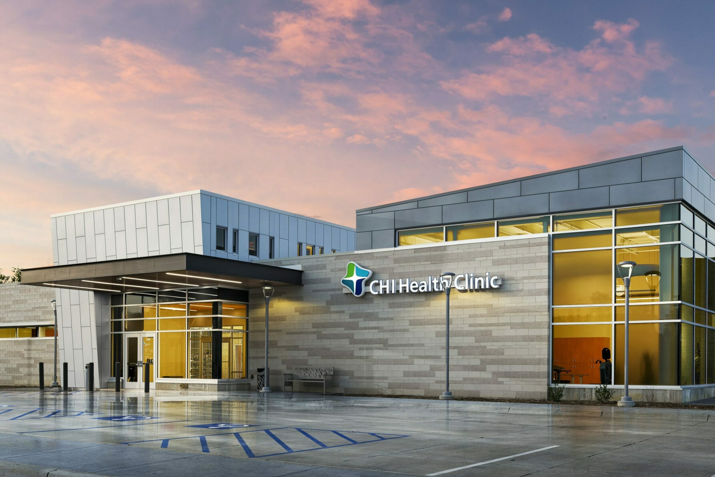 Exterior front view CHI Health Clinic Valley View, blue sky, pink clouds