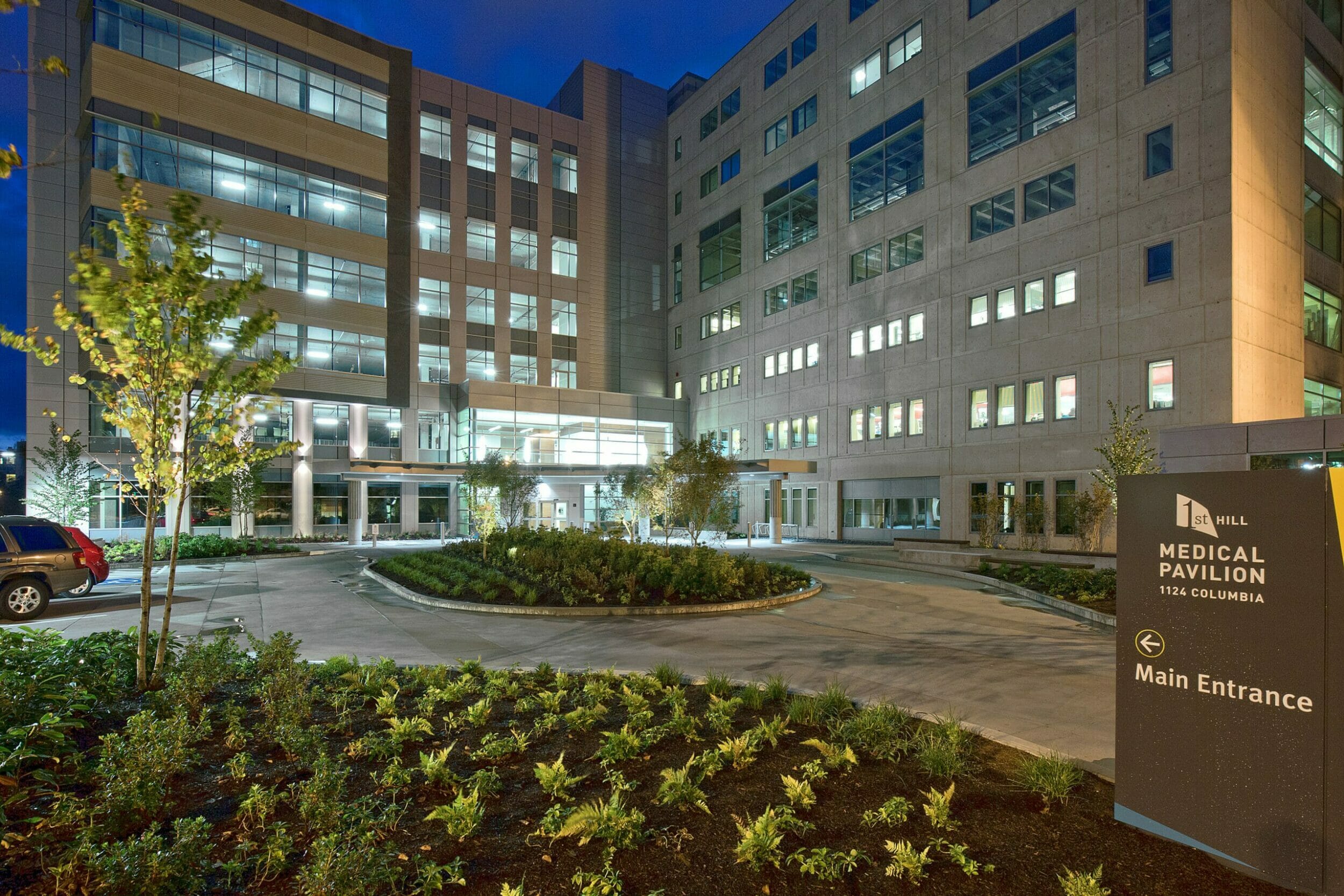 Exterior view medical pavilion building main entrance evening sky