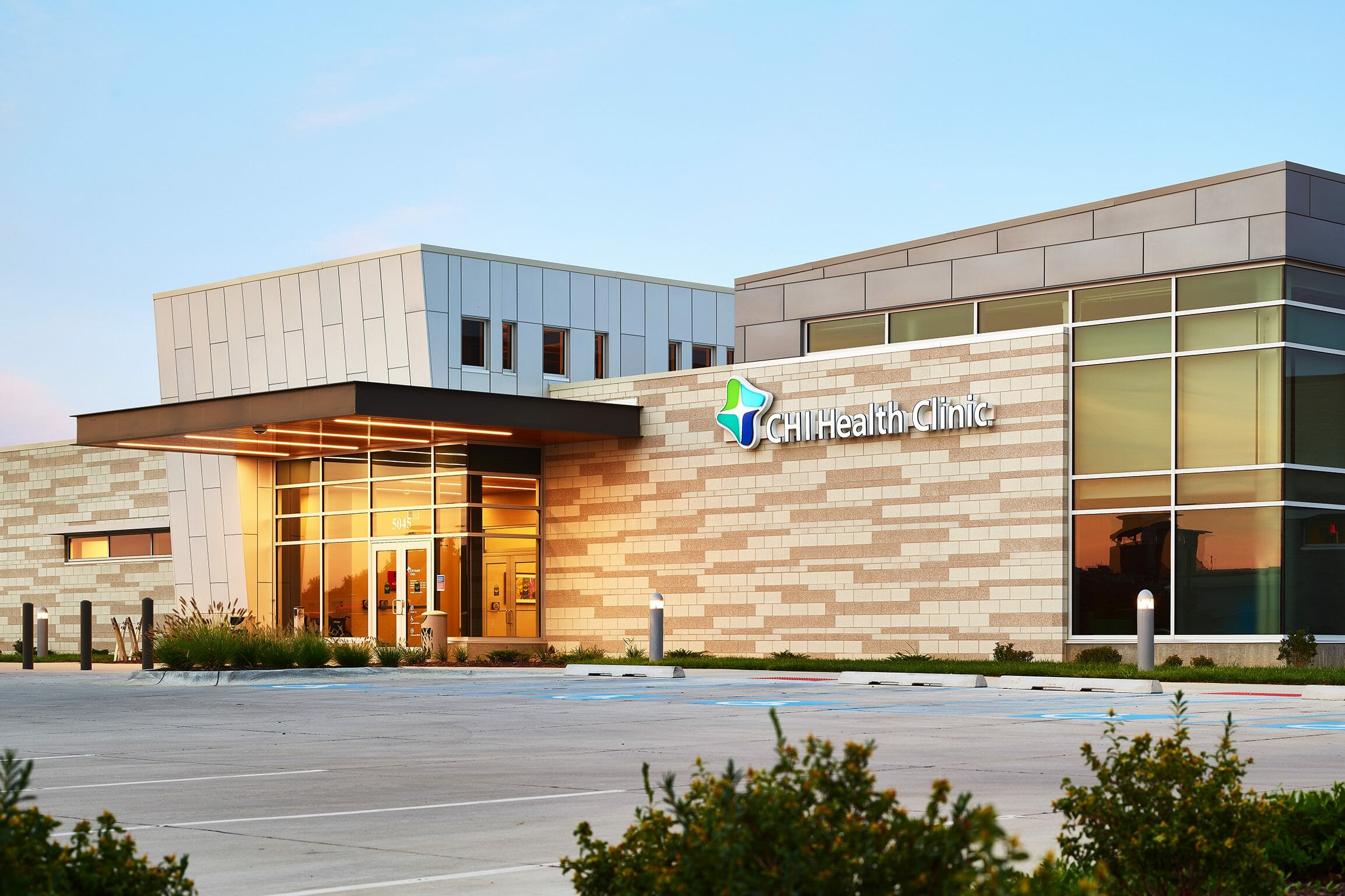 Exterior front view CHI Health Clinic Millard, blue sky