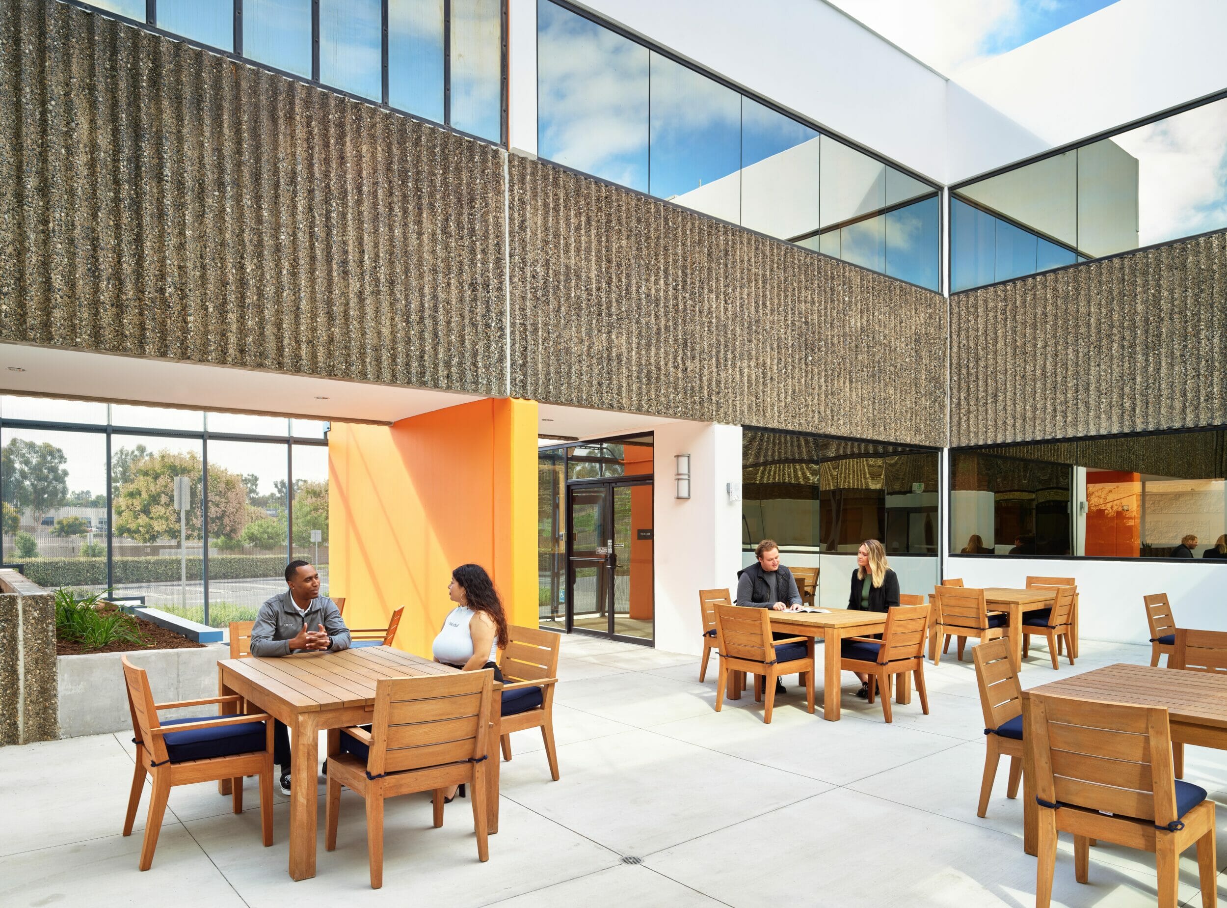 HATCHlabs @ Irvine Spectrum outdoor patio area with tables and seating